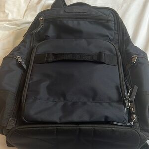 Tumi Navy and Black Pack Back in very good condition